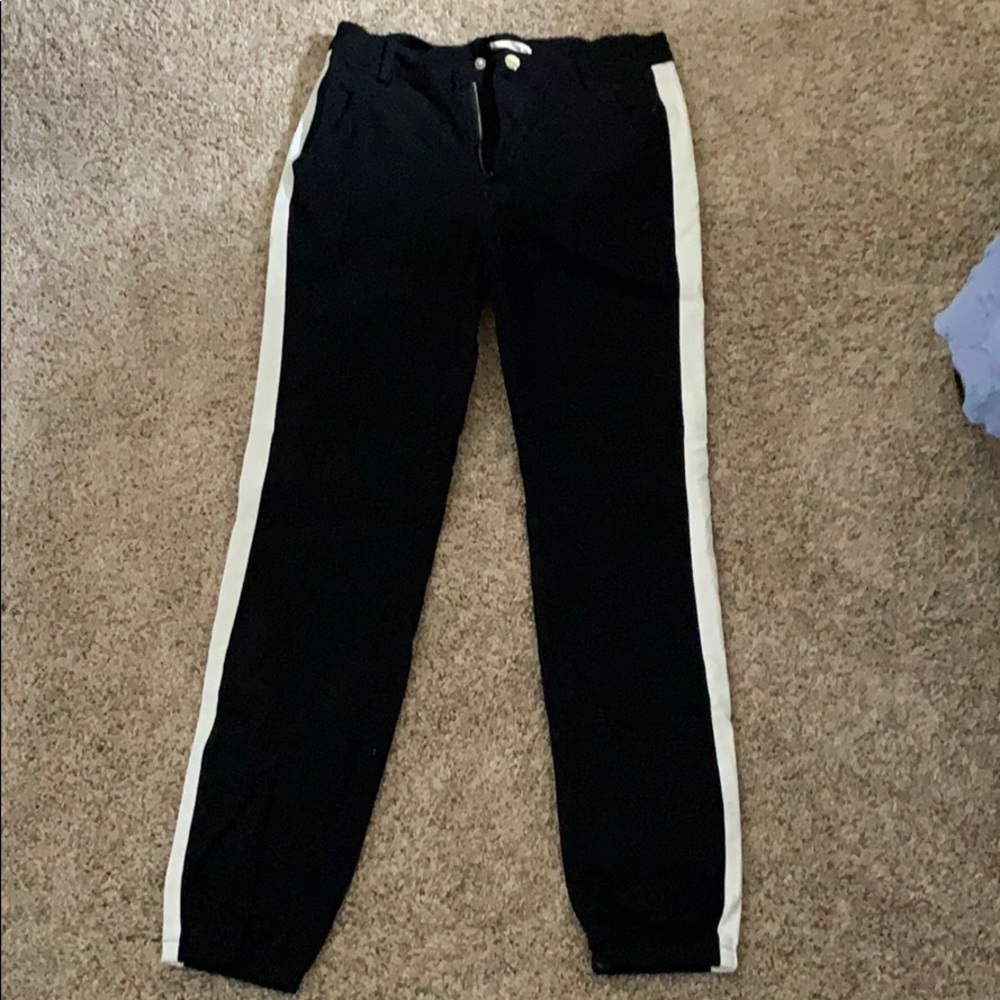 Black joggers with white side strip
